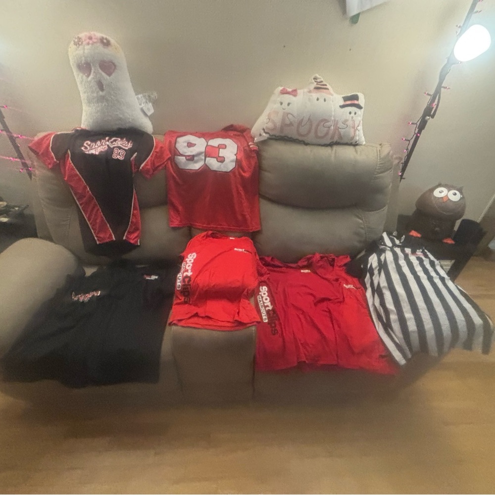 Red and Black Sport Clips uniforms